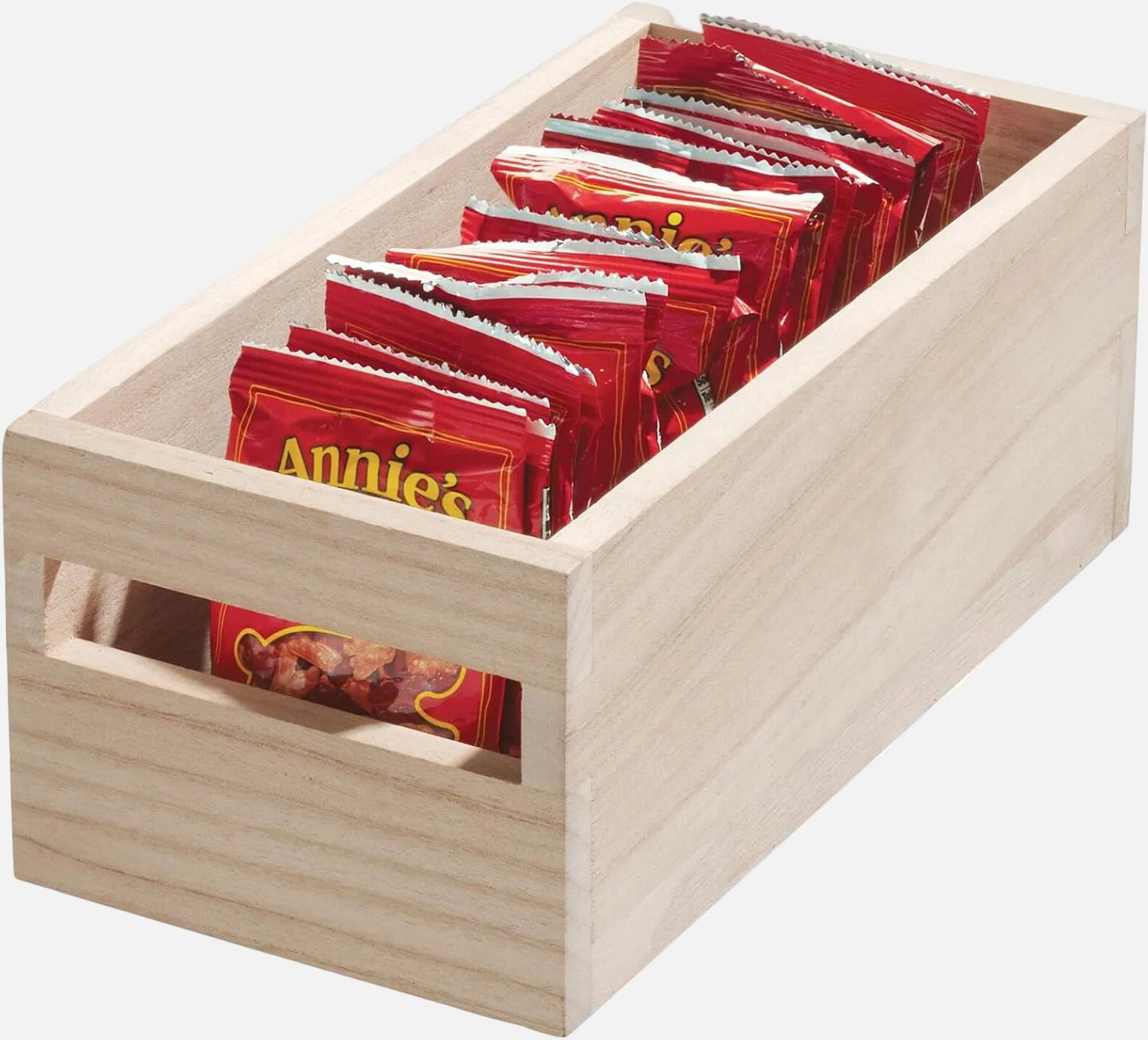 Wooden box with Annie's brand snack packs on a white background