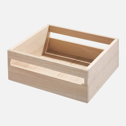 A light natural wood rectangular storage box with a slanted open top and a recessed front handle, shown on a plain white background.