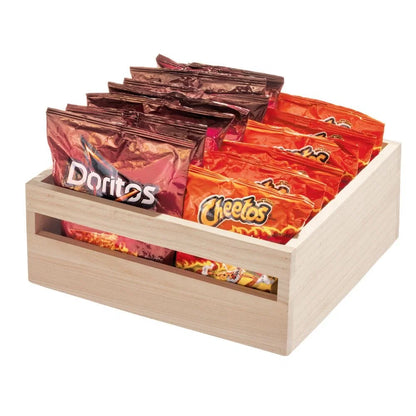 A light natural wood snack display box filled with bags of chips, including Doritos and Cheetos, on a plain white background.
